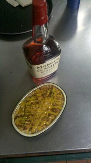 Beef Brisket with Smoked Cheddar and Maker’s Mark BBQ sauce Mac and Cheese